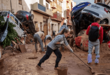 spains floods bring climate change and fossil fuel giants into focus