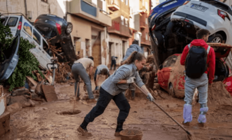 spains floods bring climate change and fossil fuel giants into focus